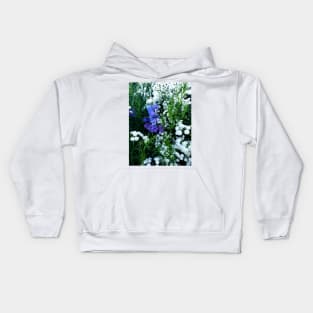 Delphinium surrounded by tiny white flowers Kids Hoodie